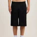 Palm Angels Back Curved Logo Track Shorts Front In Black