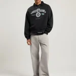 Model wearing Palm Angels Dollar Loose Crew Sweatshirt casual streetwear look