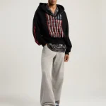 Model wearing Palm Angels Flames Flag Zip Hoodie styled with streetwear
