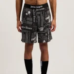 Model wearing Palm Angels PaxLaTimes Drawstring Shorts front view